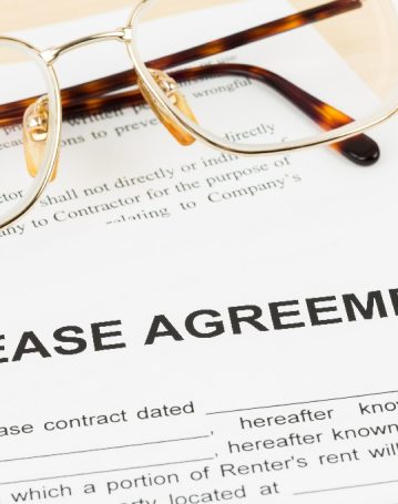 Lease,Agreement,With,Glasses;,Document,And,Information,Are,Mock-up